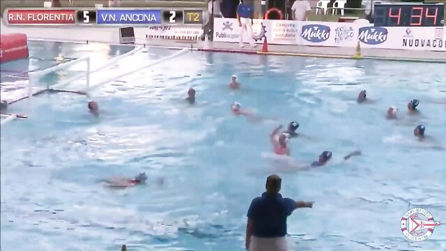 Water polo match with athletic women swimmers in pool action