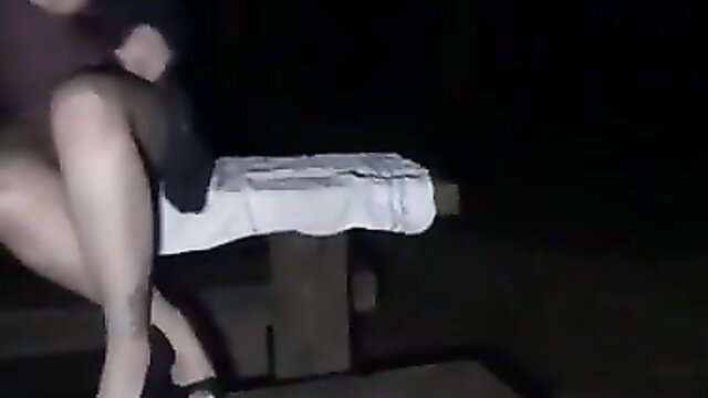 Amateur Asian woman dogging outdoors at night, sheer top legs spread