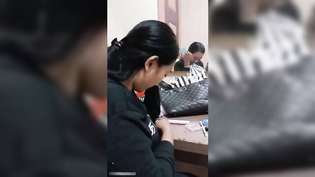 Two Asian women in black hoodies at table, one emotional, amateur cheating tease