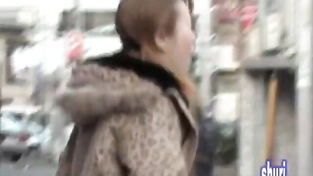 Elegant long-legged Asian minx shocked by pants sharking attack on street