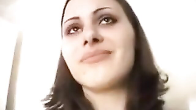 Closeup of pretty Russian brunette smiling in homemade voyeur casting