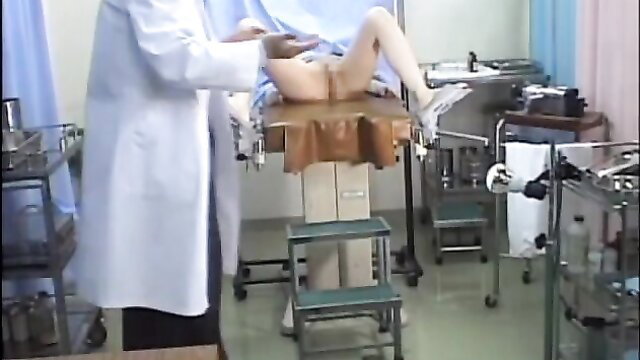 Japanese girl pussy exposed on gyno table for doctor exam