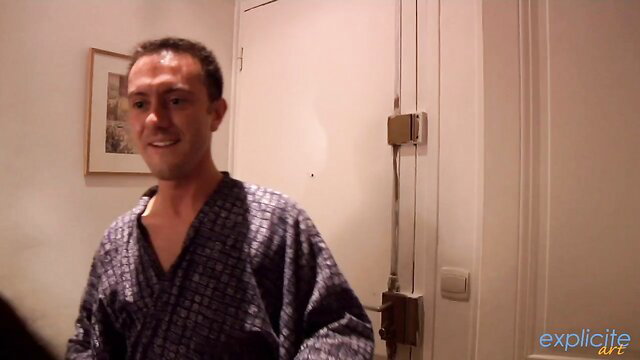 Sharon Lee Asian escort in open kimono robe smiling seductively