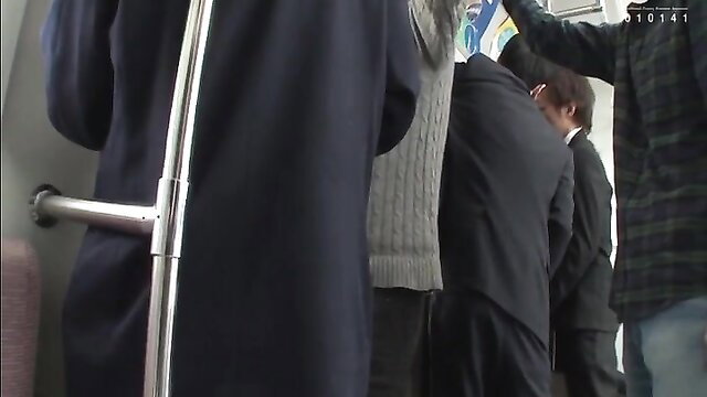 Crowded Japanese train with men groping suited women upskirt