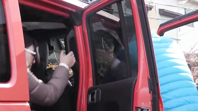 Chubby Japanese wife Rinka Tahara in red Jeep door, neighborhood tent event