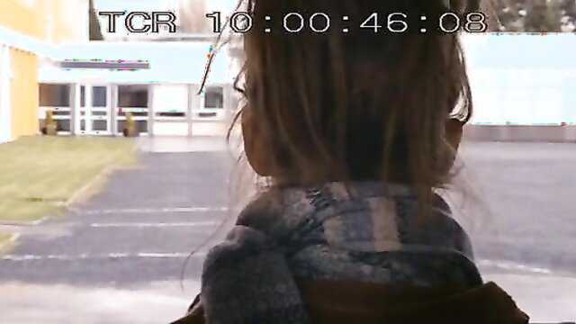 Blue Is The Warmest Colour girl with long brown hair in scarf at school outdoor