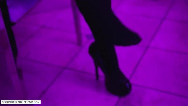 Sheena Ryder's sexy black stockings and high heels closeup