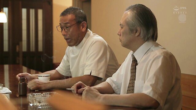 Ai Sayama & man smoking at table in JAV, busty widow thumbnail