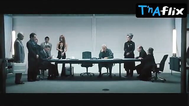 Bai Ling in sexy suited office meeting scene from Southland Tales