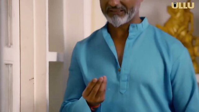 Mature Indian man in blue kurta prays in Ullu Charmsukh scene