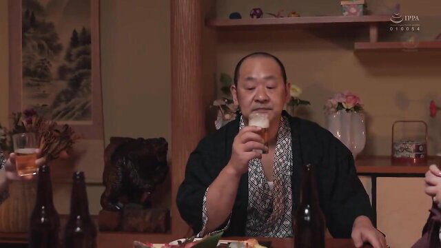 Nina Nishimura's boss in kimono drinks sake at hot spring party