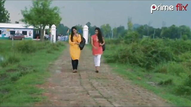 Two sexy Indian Desi girls in salwar kameez walking rural path, Ullu hot series