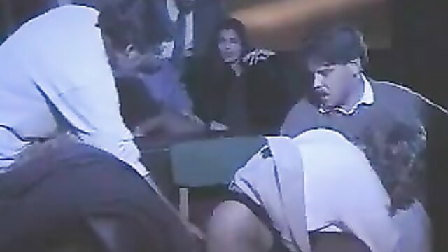 Dalila bent over table in gangbang at adult cinema xHamster