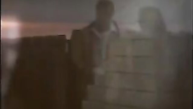 Blurry cheating wife stands with man in dim lit room free porn thumbnail