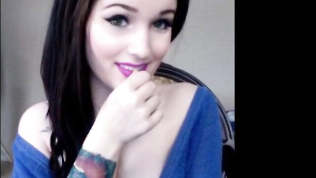Hot white girl Natasha smiling seductively with tattoos, off-shoulder top