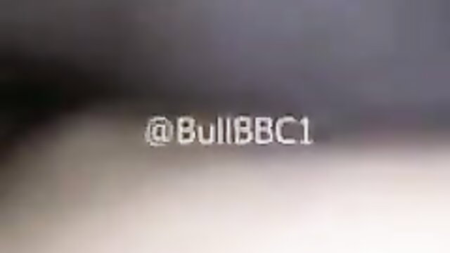 Blurry closeup of hot babe's face with @BullBBC1 watermark