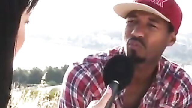 Asian MILF interviews black guy with cap in outdoor xHamster amateur scene