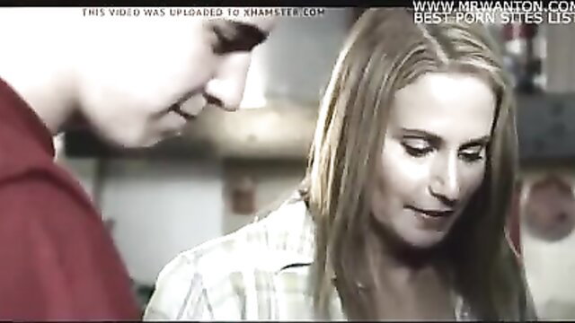 Blonde MILF in plaid shirt flirts with young guy at home while dad away