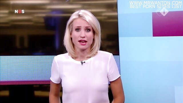 Hot blonde reporter Dionne Stax in tight white top on news set