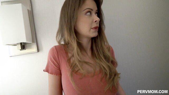 Emily Addison in pink top, sultry gaze, PervMom watermark