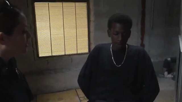 Black guy licks suspect's anus in police custody scene