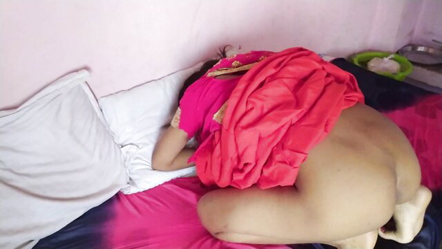 Indian Didi in red saree bent over bed, exposing big nude ass for JijaJi morning fuck