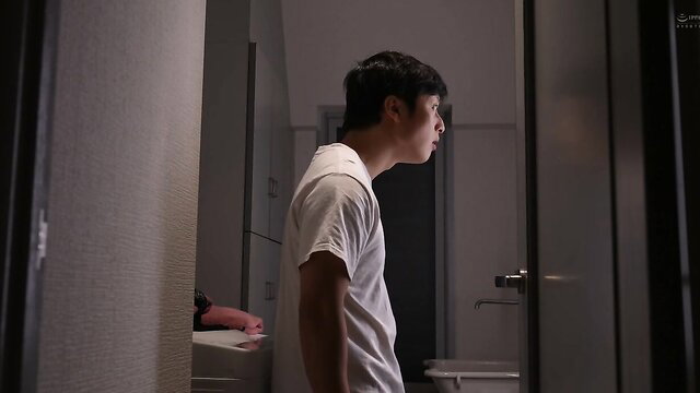 Lonely horny Asian mother-in-law in tight white tee, side profile view