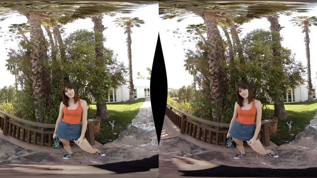 Lana Anderson in orange tank top and denim skirt outdoors Blacked Raw