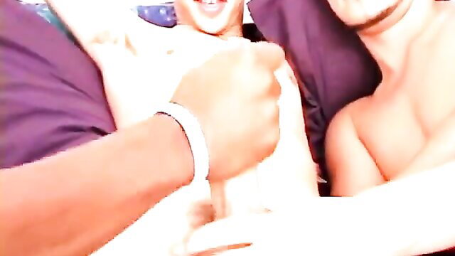 Cute twink Shawn Lane milked by hand in threesome