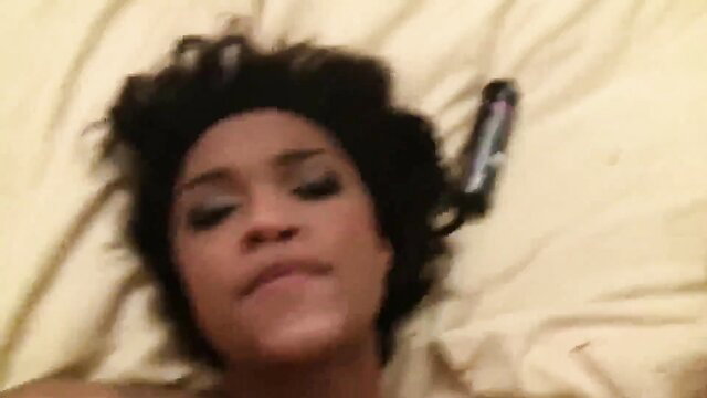 Montana Fishburne lying on bed with intense gaze, anal video thumbnail