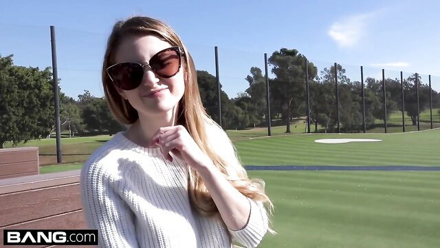 Nadya Nabakova flashes muff at golf course in sweater and sunnies