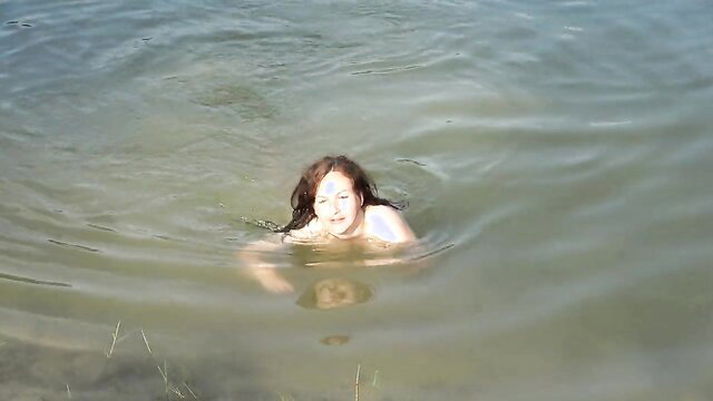 Hera Harding brunette nude swimming without panties or bra in water