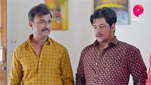 Two handsome Indian men in shirts, naughty desi gay tension