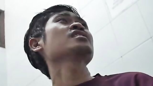 Handsome young Indonesian man looking up intensely in Film Kelas Bintang Inem Part 3