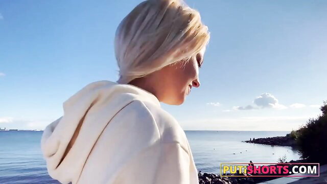 Blonde teen in white hoodie by sea, tight ass ready for big dick anal