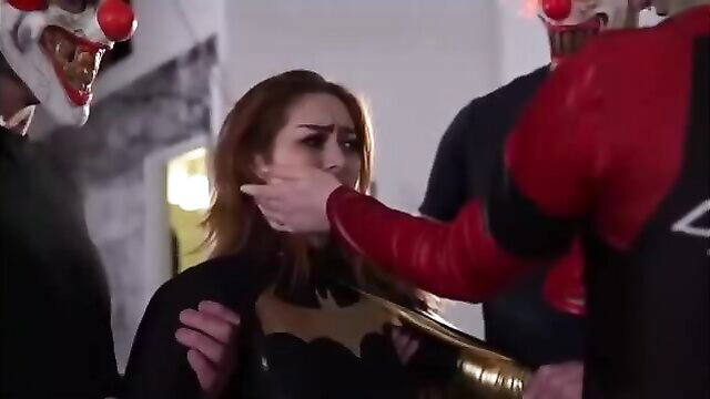 Alli Rae as Batgirl grabbed by Deadpool and Joker in superheroine peril