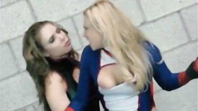 Angela Sommers as blonde Spider-Woman peril fight with brunette, cleavage exposed