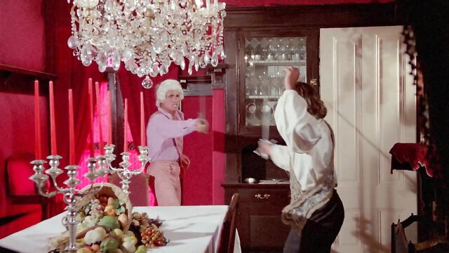 Vintage blonde couple dancing intimately in red room classic porn