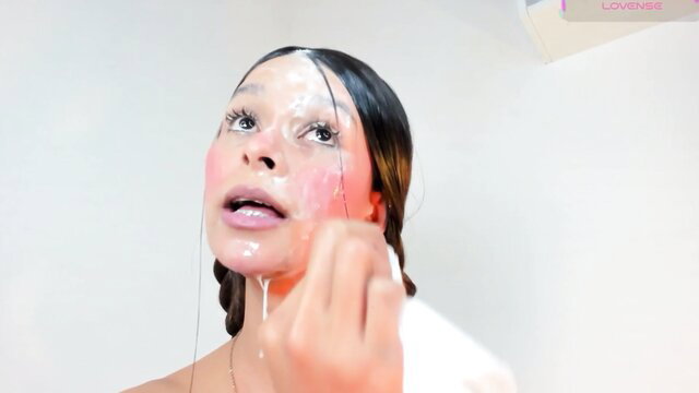 Mariaa with sloppy facial cum dripping down her face closeup