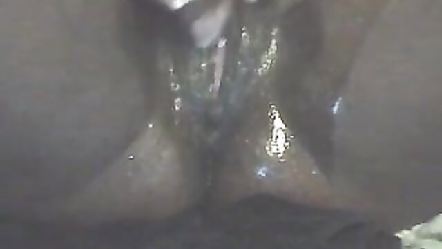 Dark skinned hoe fingers soaking wet pussy closeup solo
