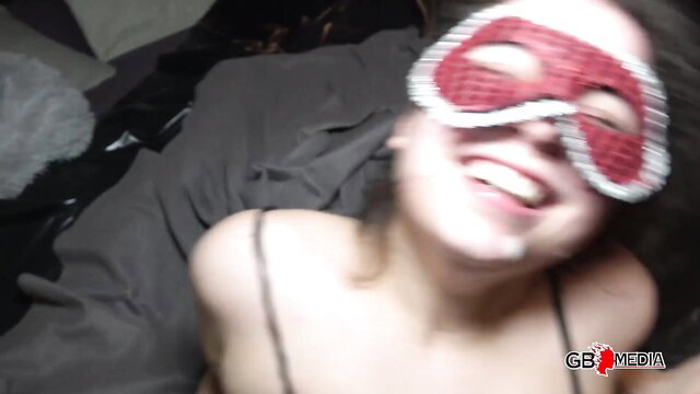 KathyCum smiling in red eye mask, topless amateur gangbang tease
