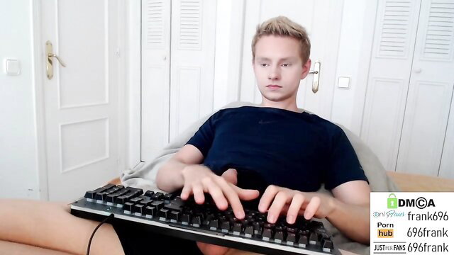 Blonde guy typing on keyboard with big cock out on cam, Chaturbate style