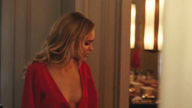 Lily-Rose Depp in sexy red dress, deep cleavage in The Idol s01e01