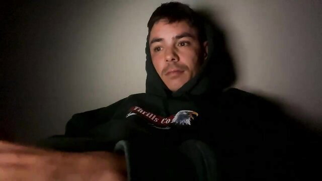 Latino twink in hoodie leans back, intense gay amateur thumbnail