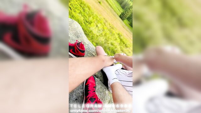SneakMaster96 hot twunk in red TNs and milky socks shows stinky soles outdoors