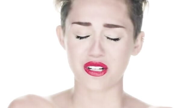 Miley Cyrus lookalike closeup pouty lips open wide, seductive eyes