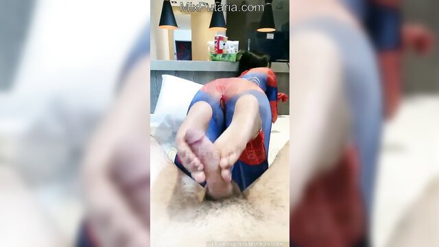 Bianca in Spider-Man suit giving steamy footjob, soles up close
