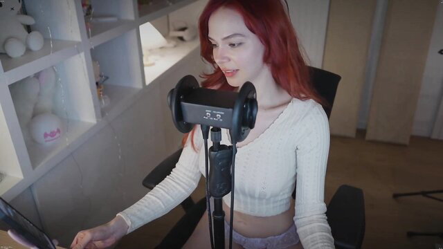 Redhead MaimyNyan smiles at camera in tight white sweater on OnlyFans stream