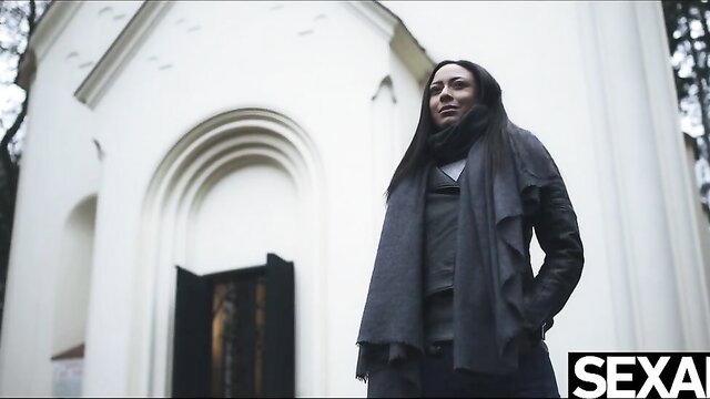 Asian busty mom in leather coat at chapel, lesbian fingering ahead