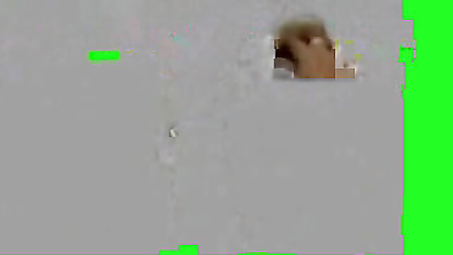 Blonde woman closeup face with green highlights, smoking in explicit scene